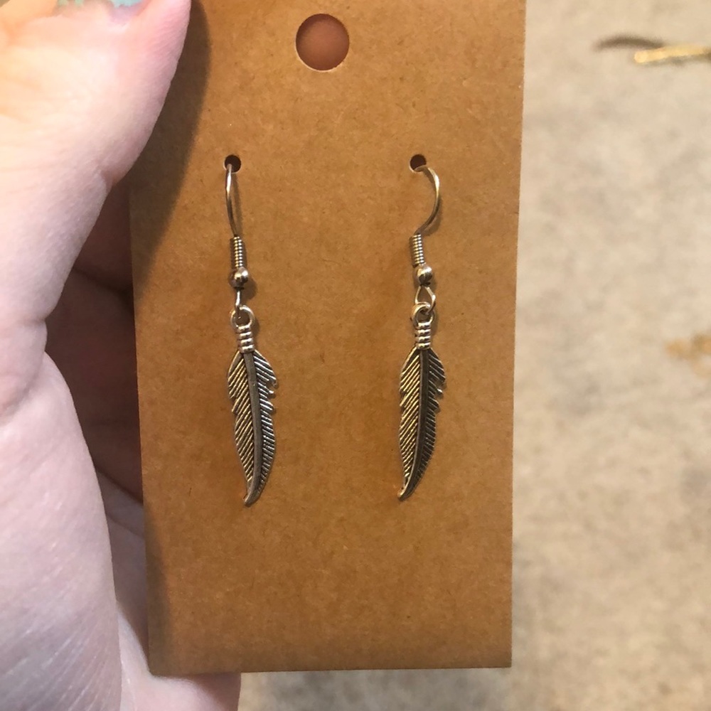 Silver feather earrings
